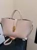 Bolsa de mão vintage estilo francês para mulheres, novo modelo verão 2025, bolsa de ombro e transversal para o trabalho, bolsa tote simples de cor sólida