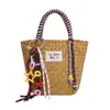 Bolso de Paja Tejida Simple Hecho a Mano Estilo Coreano 2026 Nuevo para Primavera/Verano Bolso de Mano Casual Bolso Tejido de Moda Tendencia