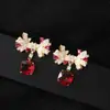 Pendientes de Tachuela de Circonita con Lazo Multicolor Temperamento Elegante de Gama Alta Azúcar Cubo Circonita Pendientes Coloridos de Comercio Exterior