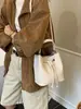 Bolso tipo cubo retro con cordón para mujer, nuevo estilo 2026, moderno y versátil, con un toque de alta gama, adecuado para llevar al hombro o cruzado, y se puede llevar debajo del brazo para un look casual