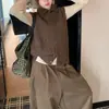 Colete de tricô de lapela de abotoamento simples para mulheres, sem mangas, macio e felpudo, corte solto, perfeito para usar em camadas, peça de outer wear de suéter para outono e inverno