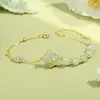 Pulsera Original de Jade Hetian de Tulipán y Trébol de Cuatro Hojas, Pulsera de Estilo Retro Chino Nuevo con un Toque de Alta Gama, Joyería de Plata Pura