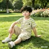 Traje de Verano de Manga Corta para Niños 2026 Nuevo Elegante Conjunto de Dos Piezas Rayado con Cuello Redondo para Bebé Ropa de Verano Ropa Infantil de Moda