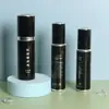 Fábrica en stock venta al por mayor botella vacía de emulsión productos para el cuidado de la piel empaque de aluminio anodizado liner de vidrio bomba de presión botella vacía de esencia