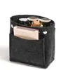 Bolsa cosmética de fieltro al por mayor transfronteriza color sólido simple moda bolsa interior viaje gran capacidad almacenamiento bolsa de aseo