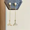 Brincos de prata S925 com haste de agulha, cauda de sereia com pérolas Swarovski, brincos longos com franjas que valorizam o rosto, pequenos acessórios cross-border