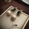 Pendientes de plata con luz de aguja, de lujo, de circonita negra de alta gama, con un toque de amor, pendientes geométricos de temperamento nicho, con un diseño único y sentido del humor.