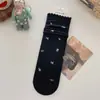 Calcetines florales para mujer, primavera y otoño, calcetines de algodón con lazo, calcetines de encaje hasta la mitad de la pantorrilla, calcetines sin costuras de estilo japonés con estampado de corazones y puntos