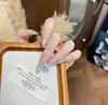 Parche de uñas francesas de alta calidad con diseño de explosión, con diamantes de imitación para llevar a mano, acabado con 30 piezas extraíbles.