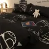 Juego de ropa de cama de cuatro piezas de algodón lavado grado A, nuevo estilo 2026, funda de edredón, sábana plana y sábana ajustable, adecuado para dormitorios de estudiantes, juego de tres piezas, talla 4