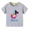 2026 Ropa Infantil Transfronteriza Camiseta de Manga Corta de Verano para Niños y Niñas Camiseta Base de Dibujos Animados Camiseta de Manga Media para Bebé Top de Moda