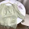 Blusa de chifon estampada com manga morcego estilo casual para mulheres, top elegante de corte solto, camisa floral leve de chifon, camisa com proteção solar