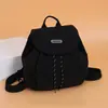 Al por mayor 2026 Nueva Mochila para Estudiantes de Secundaria Versátil Casual Moda Mochila Color Bloque Letra Cierre de Cordón Bolso de Hombro Doble para Mujer