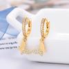 Pendientes de mariposa con corazón microincrustado para mujer, diseño de nicho de lujo ligero, nuevos pendientes de aguja de plata 925 de alta calidad.
