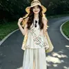 Nuevos atuendos de verano de moda nacional estilo chino: Top de tirantes popular de este año + pantalones de pierna ancha para mujer/artículo individual