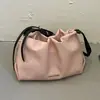 Design de nicho transfronteiriço, textura de alta qualidade, nova moda verão 2026, bolsa tote versátil de grande capacidade para ombro e transversal
