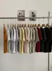 Camiseta Top Corta de Algodón Canalé de Color Sólido con Cuello Redondo, Botones y Mangas Cortas Ajustada para Mujer en Primavera y Verano 6413