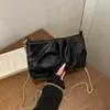 Elegante y casual, este bolso de hombro único presenta un diseño minimalista y es una nueva adición a la colección de moda de verano 2026, perfecto para mujeres. Es una bolsa pequeña de forma cuadrada