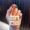 Llavero de Teclado de Sonido de Cuatro Rejillas Juguete para Aliviar el Estrés Pez de Madera Electrónico Colgante para Bolso Regalo Pequeño