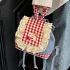 Mochila de Mezclilla para Mujer 2025 Nueva Moda Tendencia Mochila de Cuadros con Encaje Bolso de Mano para Hombro