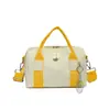 Bolso de mano transfronterizo, bolso ligero de color bloqueado versátil casual para el día a día, bolso de viaje para mujer, bandolera al por mayor impermeable