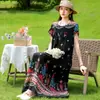 Elegante y moderno vestido de noche de algodón y seda de verano nuevo para madres de mediana edad y mayores, elegante vestido casual holgado para el hogar para mujer