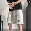 Pantalones cortos de moda para hombre de verano, tejido gofrado personalizado a la moda, pantalones cortos rectos holgados de color liso, estilo de celebridad de internet