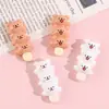Accesorios de resina de dibujos animados de cachorros de línea Accesorios DIY hechos a mano con pegamento de crema para funda de teléfono llavero pasador imán para refrigerador