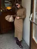 Conjunto de Suéter de Gola Alta Elegante e Versátil com Caimento Justo + Saia - Novo Estilo Outono e Inverno 2026 Europeu e Americano Transfronteiriço