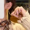 Aretes Dorados Geométricos Brillantes de Múltiples Capas con Borlas Largas para Banquetes Nocturnos y Reuniones Anuales, Hacen que el Rostro Parezca Más Pequeño, Aretes de Atmósfera de Lujo Ligero