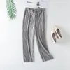 Pantalones de pierna ancha con cordones de tela brillante de verano 2022 Pantalones tipo papel Drop Pantalones casuales lisos coreanos para mujer