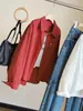 Camisa jeans de algodão lavado estilo coreano para mulheres, novo modelo outono 2026, com gola de lapela, caimento solto, versátil, de manga comprida, top casual, moderno