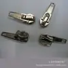 Suministro de fábrica cabeza de cremallera de aleación de zinc eléctrica Blanca Negra en stock No. 5 Cabeza automática de nailon cabeza de tracción Cabeza de bloqueo Al por mayor