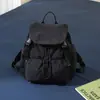 Mochila casual e artística em nylon estilo coreano para estudantes, nova mochila com cordão estilo fresco outono 2025 para mulheres