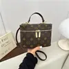 Bolso caja de alta gama estilo europeo y americano con cadena, bolso popular en línea para mujer, nuevo bolso versátil de moda para hombro y cruzado 2026