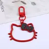 Aleación color gota de aceite hueco gato KT colgante colgante diy hecho a mano equipaje llavero funda para auriculares bolsa decoración