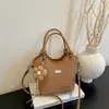 Bolso de Viaje para Mujer 2026 Nuevo Modelo Bolso de Mano Moderno Exquisito Gama Alta Bolso Cubo de Hombro Único Cruzado