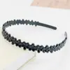 Nueva Banda para el Cabello de Plástico Estilo Simple Negro Brillante Pintada en Spray con Dientes Fija Accesorio para el Cabello para Uno o Dos Yuanes