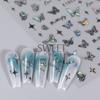 Venta al por mayor de pegatinas de mariposa roja para uñas, con láser Aurora Dark Wind, mariposa líquida 3D, calcomanías adhesivas para uñas.