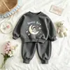 Conjunto para Niños Guapos 2026 Nuevo Comercio Exterior Sudadera con Capucha Cuello Redondo Pantalones Deportivos Ropa Urbana Fresca Conjunto Deportivo de Dos Piezas
