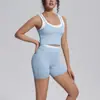 Conjunto de yoga a rayas de colorblock estilo europeo y americano, top sin mangas acanalado deportivo, shorts con espalda bonita, ropa de fitness, conjunto para correr y entrenar para mujer