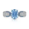 Xiaohongshu Douyin Más Vendido Anillo de Huevo de Paloma con Corte de Flor de Hielo de Piedra Preciosa de Color Incrustado con Anillo de Diamante de Alto Carbono Brillante Transmisión en Vivo