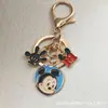 Llavero Colgante de Aleación con Mickey y Minnie de Dibujos Animados Goteo de Aceite Mejor Amigo Estudiante Colgante para Mochila Escolar Regalo Lindo