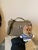 Bolso coreano de estilo fresco dopamina Otoño 2025 Moda Bolso cruzado simple con patrón de lichi para mujer
