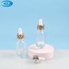 Botella de líquido Essence nueva 30ml gotero de cabeza de plástico botella de aceite esencial fondo grueso botella de líquido de vidrio líquido para la piel sub-botella