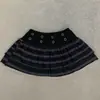 Falda corta sexy de retazos de verano estilo callejero japonés de cintura baja, minifalda de retazos a rayas estilo dulce oscuro