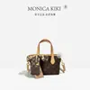 Bolso de mano vintage Monica Qiqi, bolso de hombro y bandolera de alta gama, nuevo bolso tipo cesta de moda 2026 para la ciudad