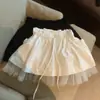 Foto real de ropa de mujer de Dongdaemun, Corea: falda corta de verano de alta calidad de cintura alta con ribete de encaje