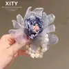 Elástico de cabelo de malha floral estilo primavera e verão, estilo Dongdaemun coreano e japonês, para rabos de cavalo altos e coques, linda corda de cabelo