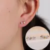 Pendientes de botón con lazo de lujo cruzado súper brillantes de venta caliente, moda, pequeños, exquisitos, de circonita, simples, versátiles para el día a día